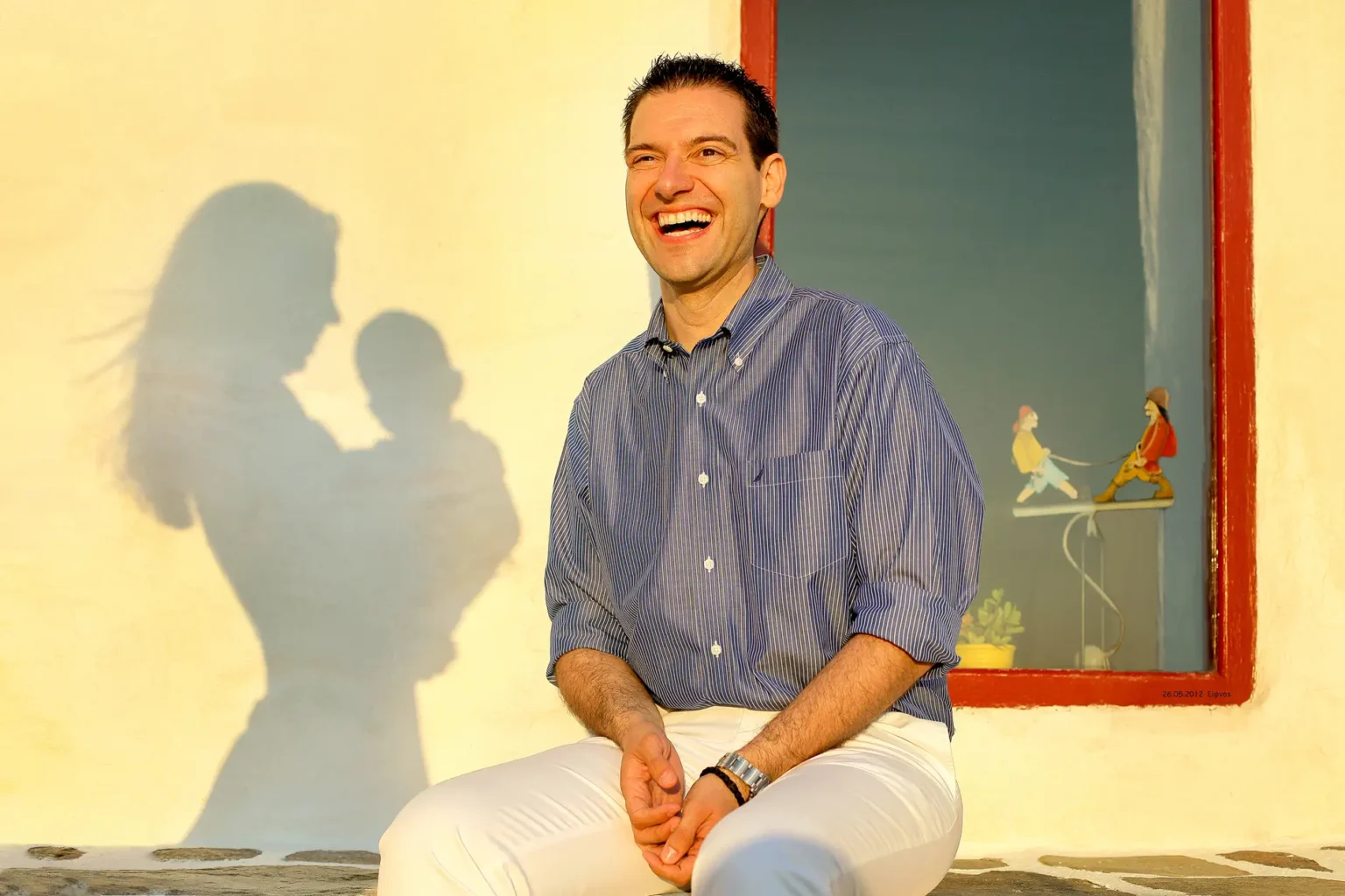 a man sitting on a bench