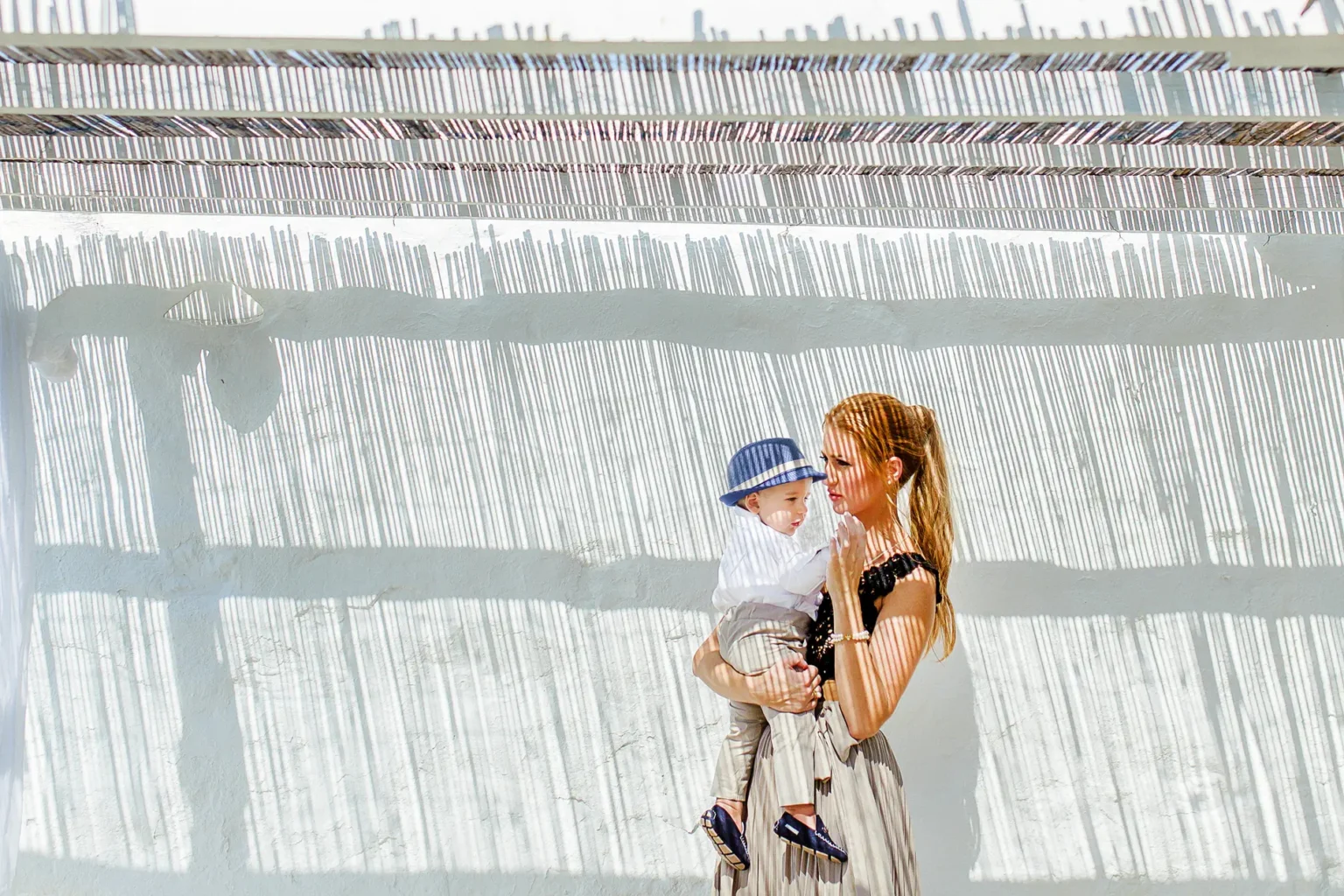 a woman holding a baby