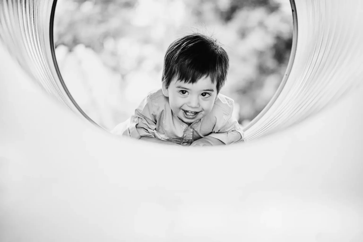 a child playing in a tunnel