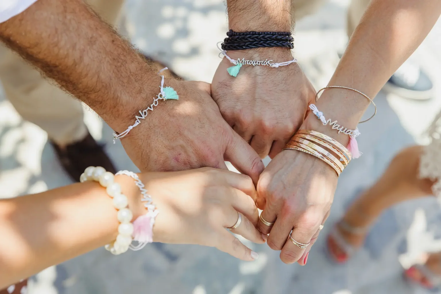 a group of people holding hands