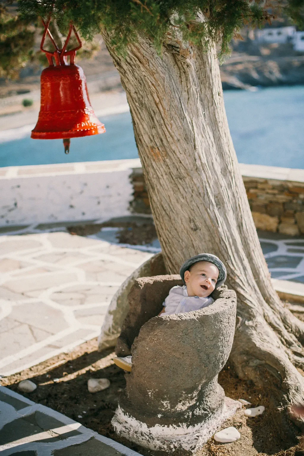 a baby in a rock bowl