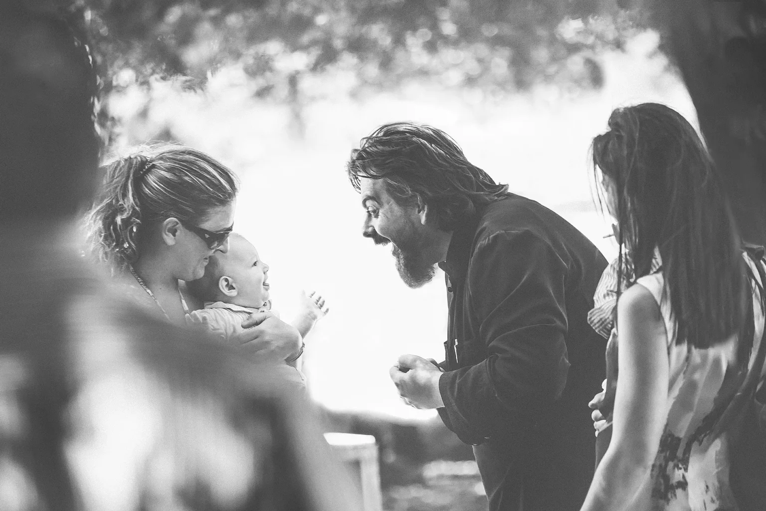 a man holding a baby