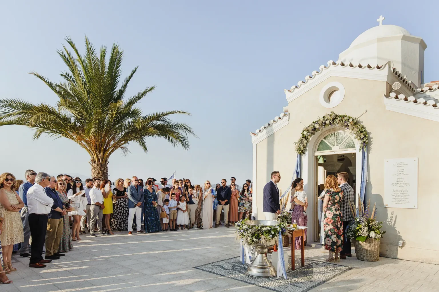a group of people standing outside a church