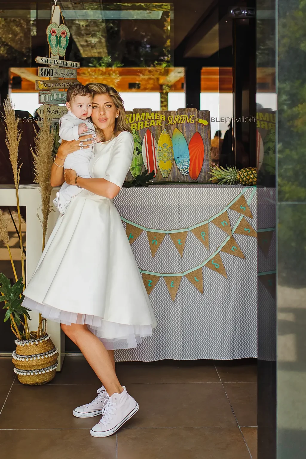 a woman holding a baby