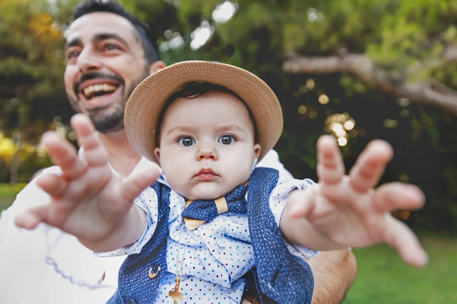 a man holding a baby