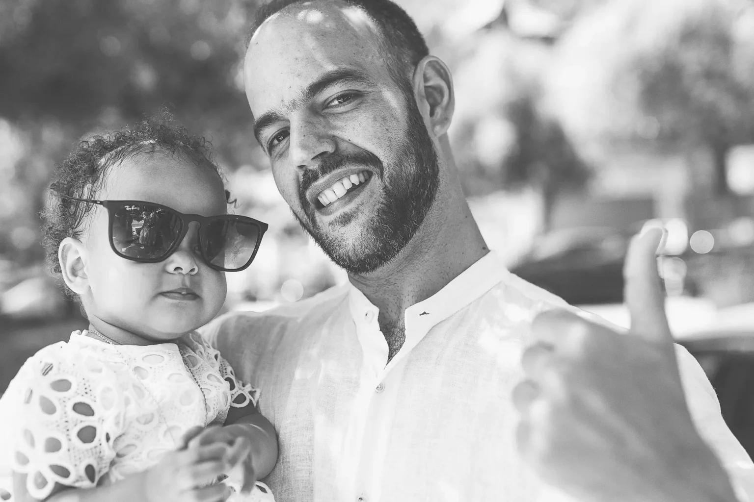 a man holding a baby