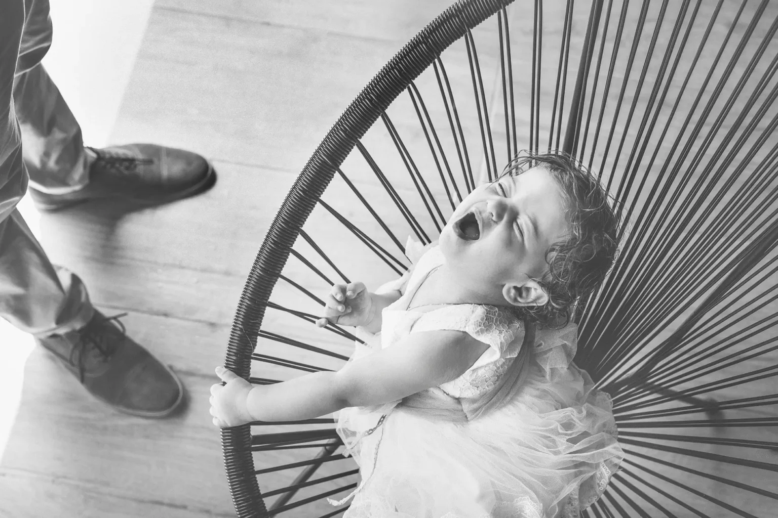 a baby sitting in a chair