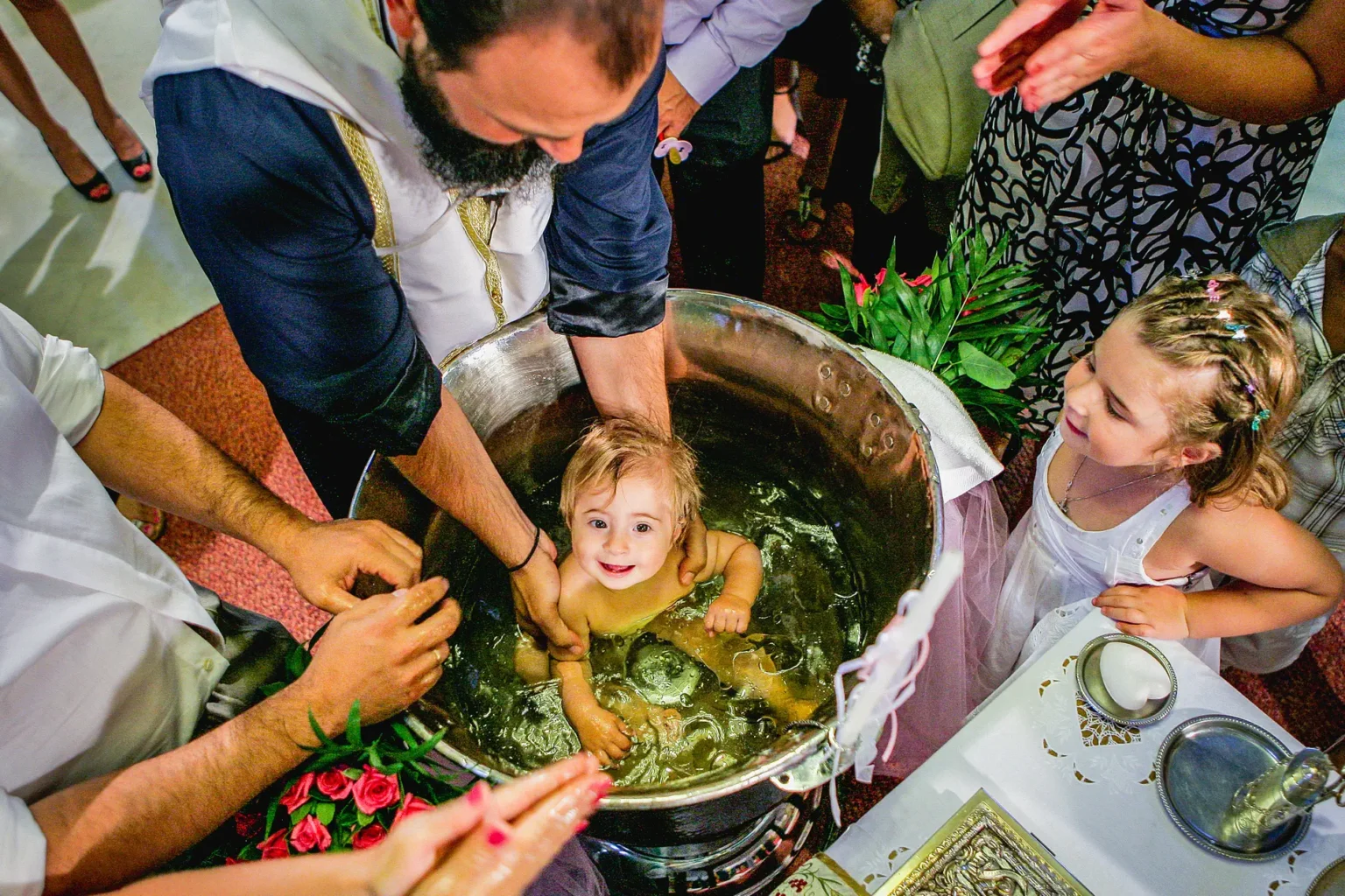 a baby in a bowl of water